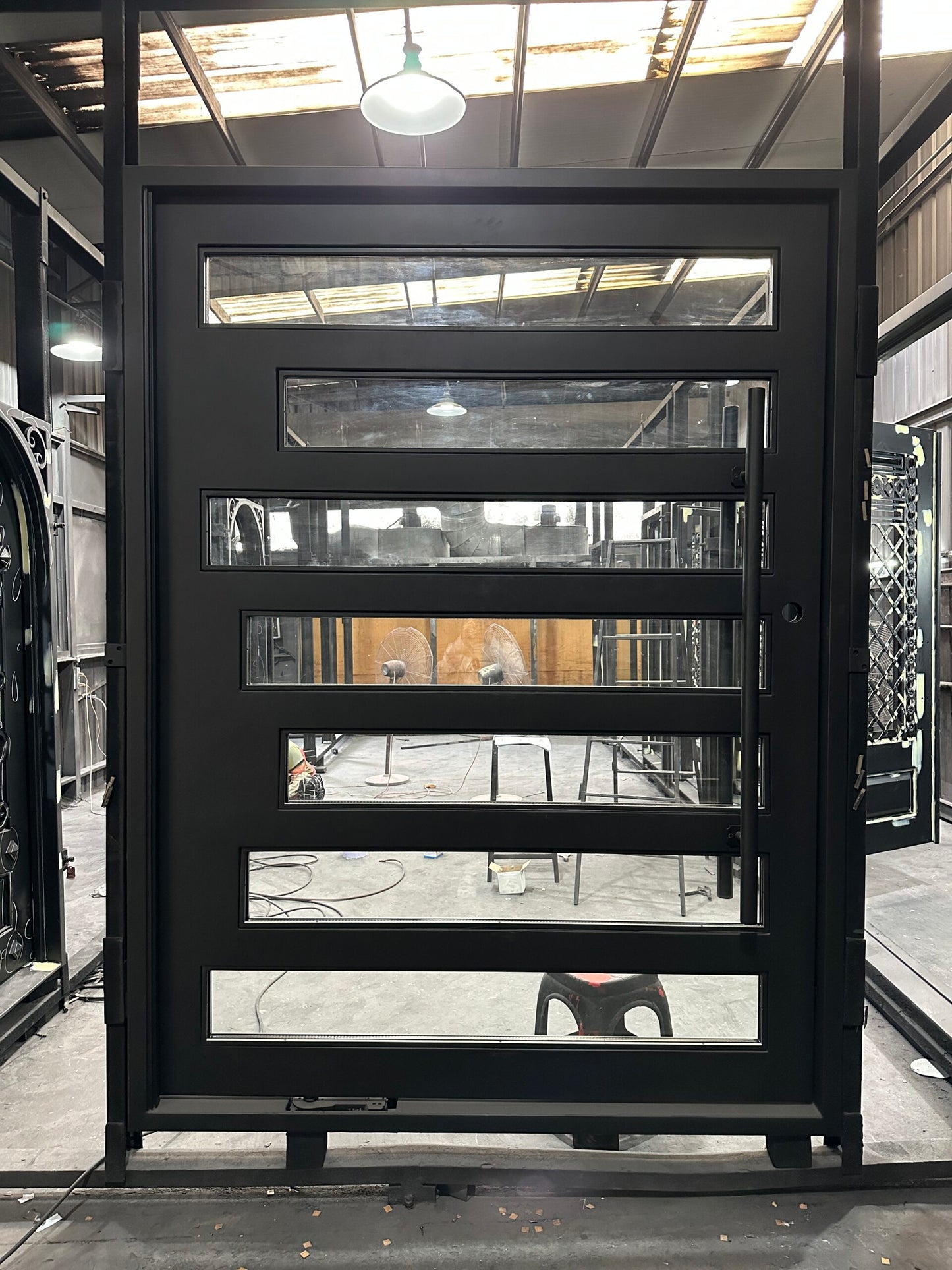 Design 56 - Pivot Iron Door