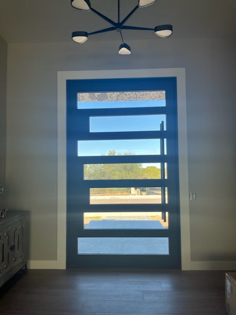 Design 56 - Pivot Iron Door